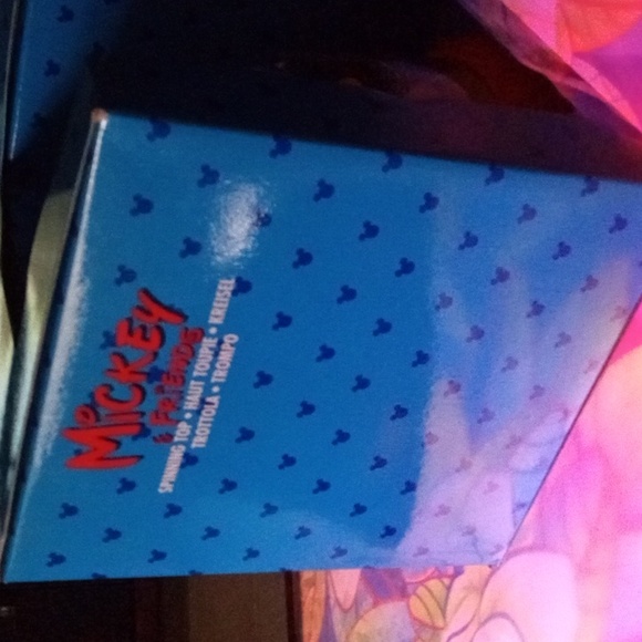 The Disney stores Spinning top for babies 6 months and up. - Picture 2 of 4